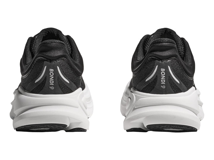 Tenis deportivos HOKA Bondi 9 en color negro con suela blanca ancha y logo lateral blanco.