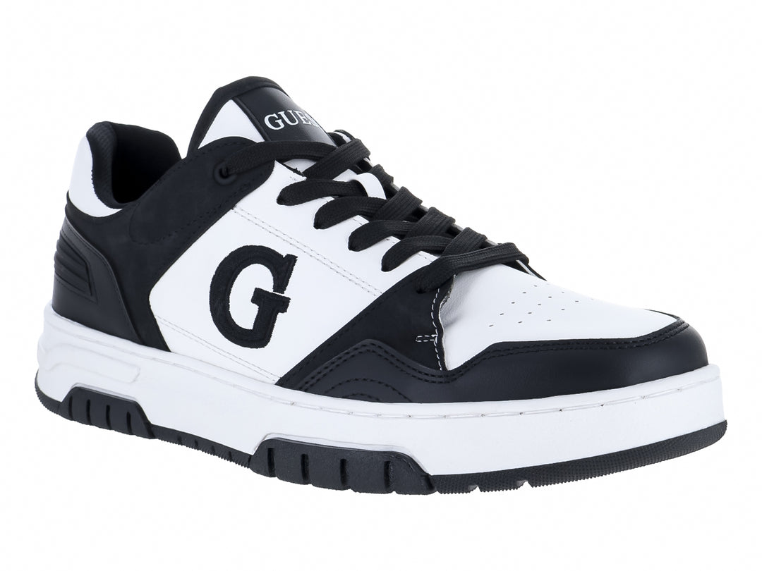 Tenis Guess en colores blanco y negro con logotipo G lateral y suela blanca y negra.