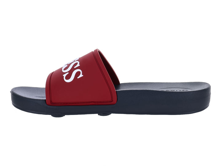 Sandalia deslizable GUESS con banda superior color vino y suela azul marino.