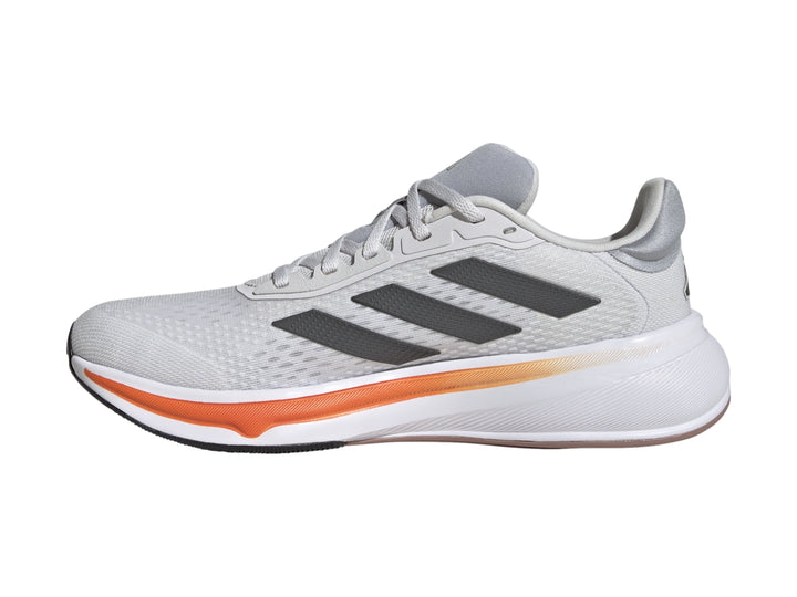 Tenis deportivos Adidas color gris con suela blanca y detalle en naranja.
