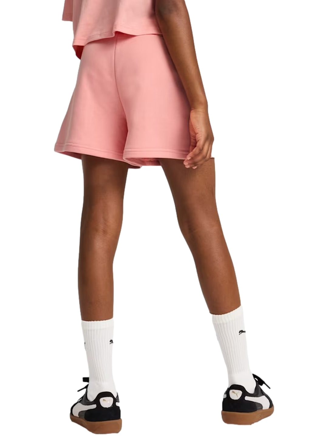 Pantalones cortos deportivos PUMA en color rosa claro para Niño o Niña.