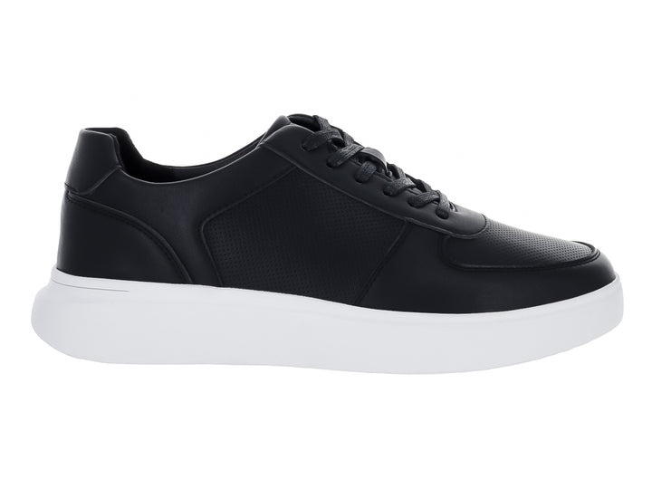 Tenis casuales color negro con suela blanca y cordones.