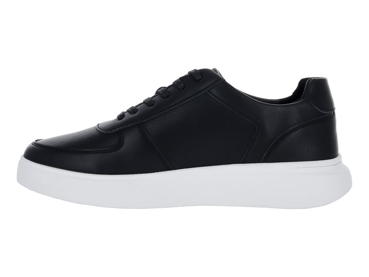 Tenis casuales color negro con suela blanca y cordones.
