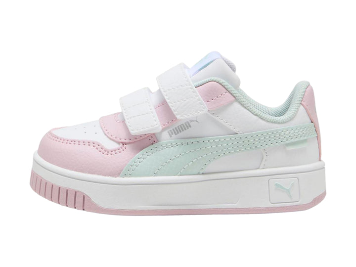 Tenis PUMA infantiles blancos y rosas con detalles en azul claro y cierre de velcro.