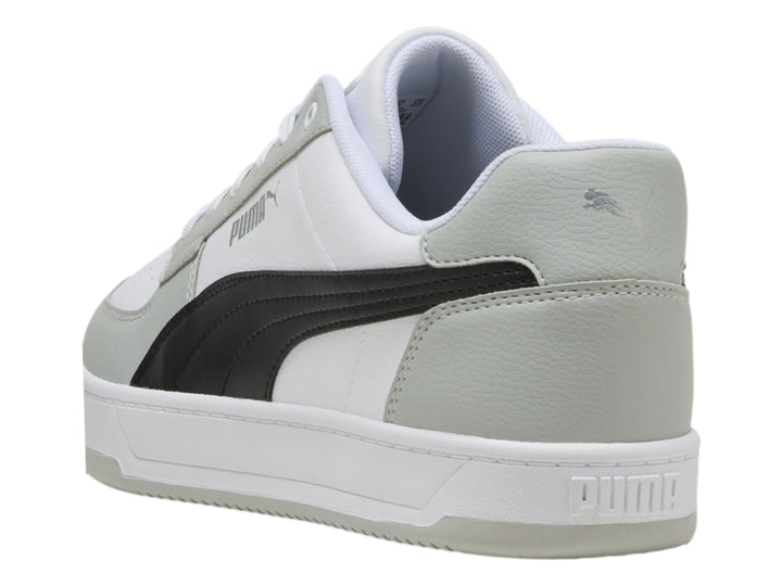 Tenis PUMA Caven 2.0 en color blanco y gris con franja negra, vista lateral.