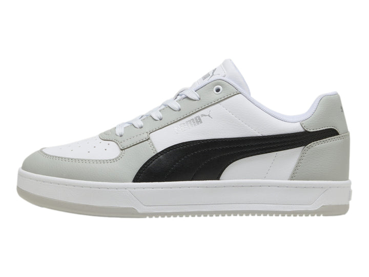Tenis PUMA Caven 2.0 en color blanco y gris con franja negra, vista lateral.