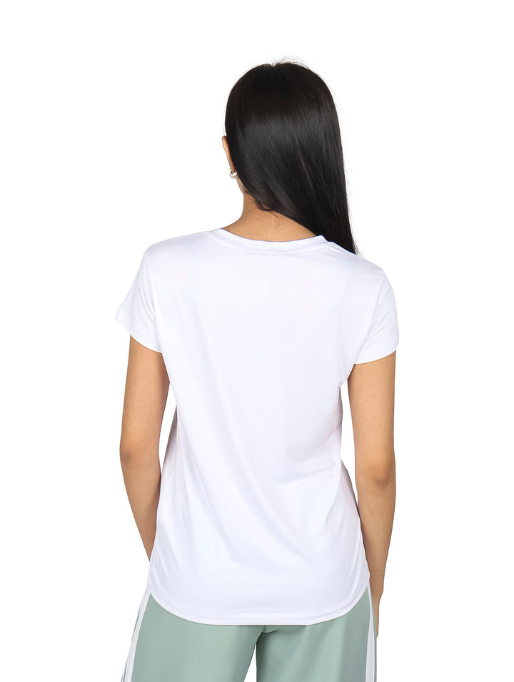 Blusa blanca de manga corta con estampado de limones y texto rosa que dice LEMON TARTE.