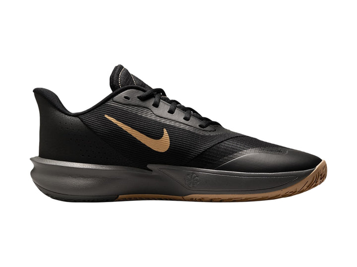 Tenis de baloncesto Nike Precision VII en color negro con detalles dorados y suela gris y beige.