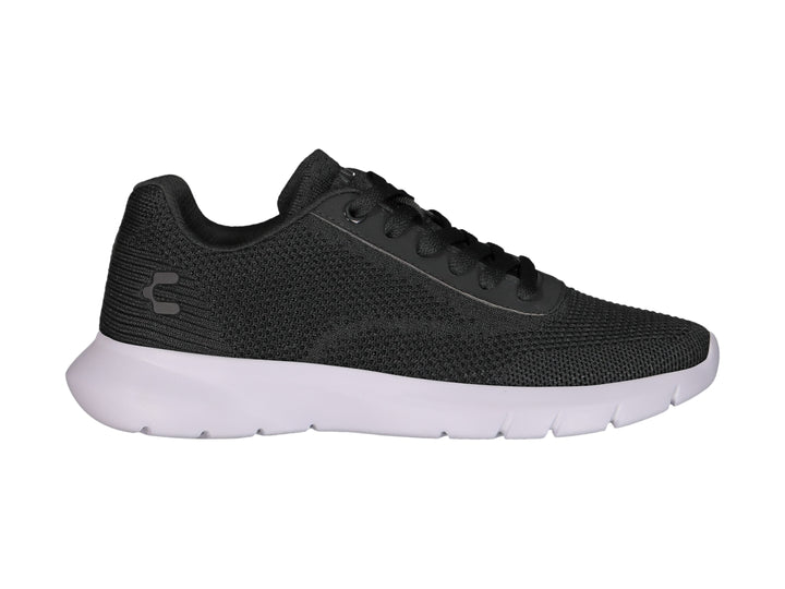 Tenis deportivos Charly color negro con suela blanca y tejido transpirable.