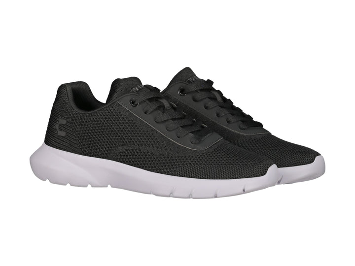 Tenis deportivos Charly color negro con suela blanca y tejido transpirable.