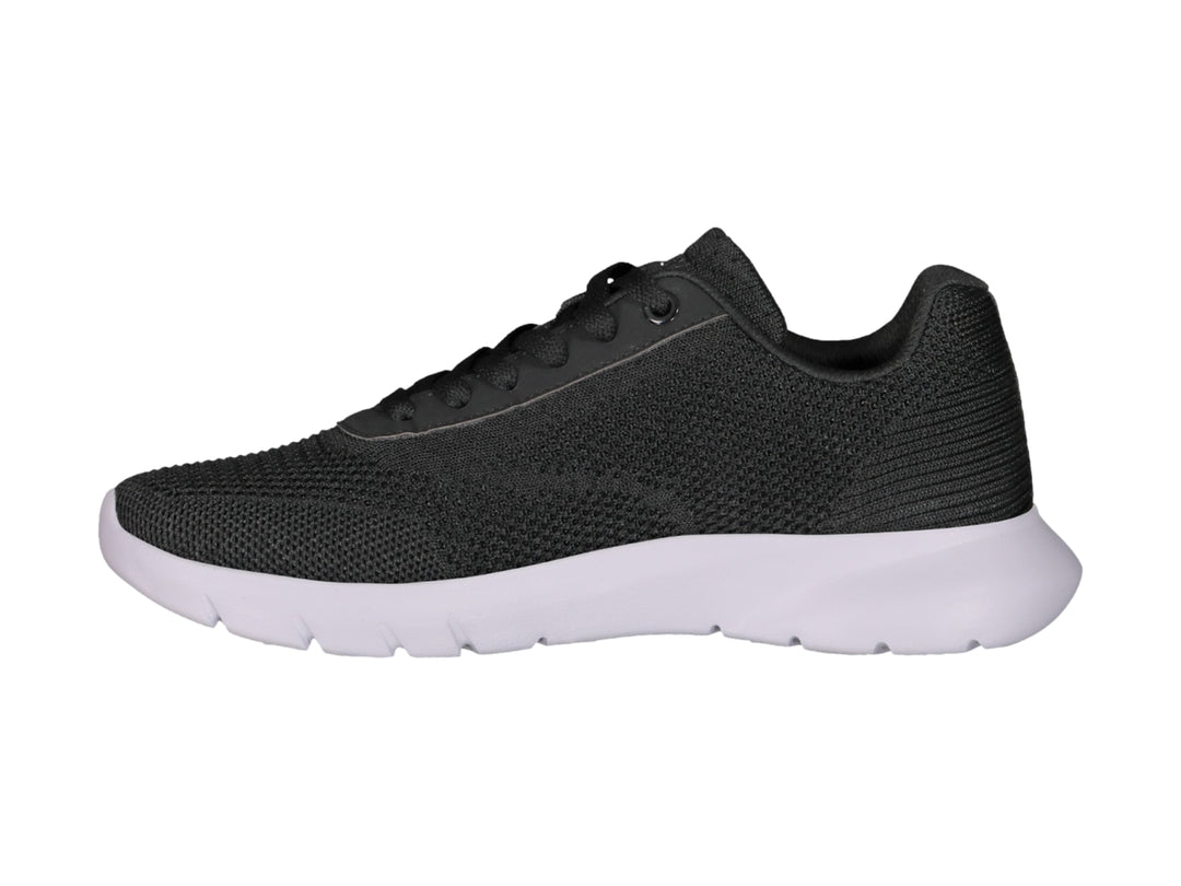 Tenis deportivos Charly color negro con suela blanca y tejido transpirable.
