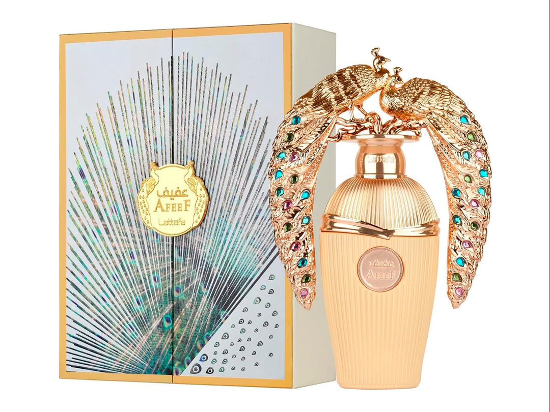 Perfume Lattafa Afeef dorado con tapa de pavo real ornamentada y su empaque.