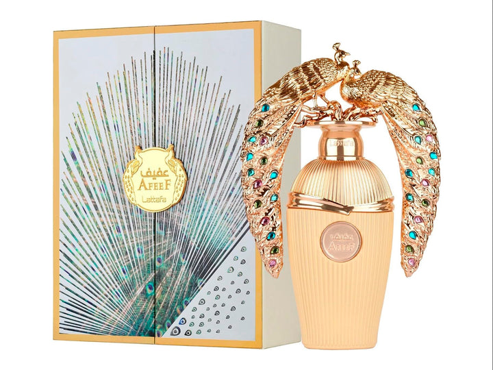 Perfume Lattafa Afeef dorado con tapa de pavo real ornamentada y su empaque.