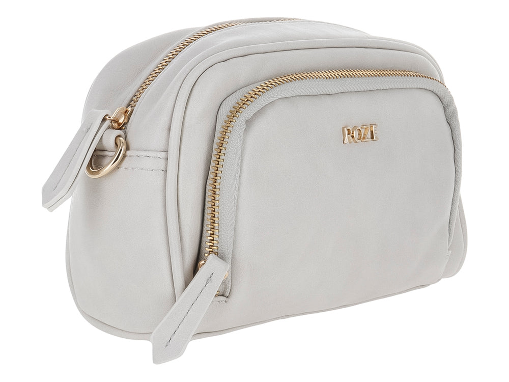 Bolso pequeño de color blanco marca ROZE con cierre dorado y diseño ovalado.