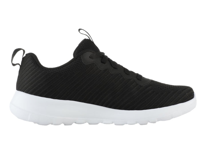 Tenis deportivos Skechers color negro con suela blanca y diseño slip-on de tejido.