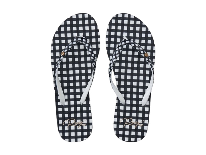 Sandalias ROXY con diseño de cuadros blancos y negros y tiras blancas.