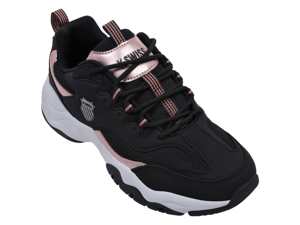 Tenis K-Swiss color negro con detalles en bronce y suela blanca gruesa para mujer.