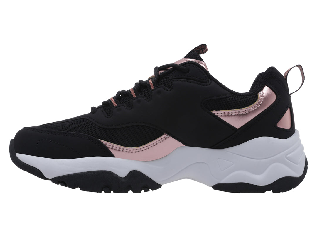 Tenis K-Swiss color negro con detalles en bronce y suela blanca gruesa para mujer.