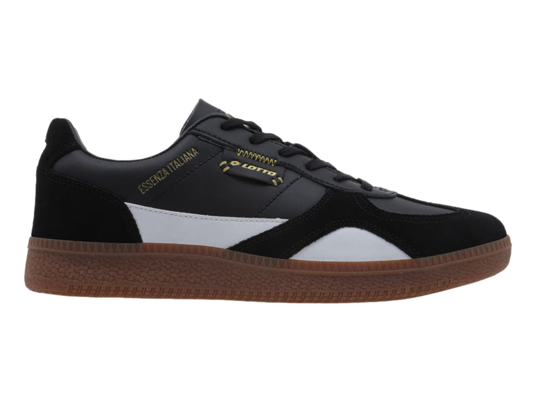 Tenis LOTTO negros con detalle blanco y suela de goma marrón.