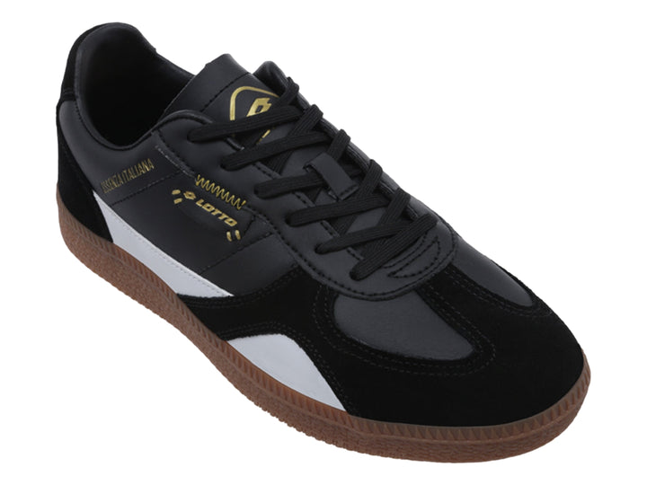 Tenis LOTTO negros con detalle blanco y suela de goma marrón.