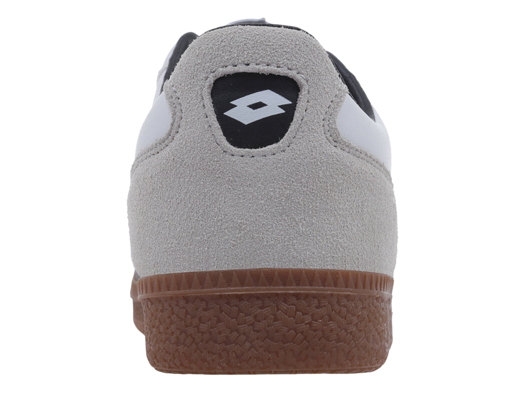 Tenis Lotto en colores blanco, gris y negro con suela color café.
