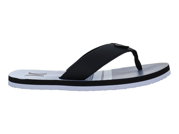Sandalias Hurley modelo Freestone en colores blanco y negro con diseño plano y correa negra.