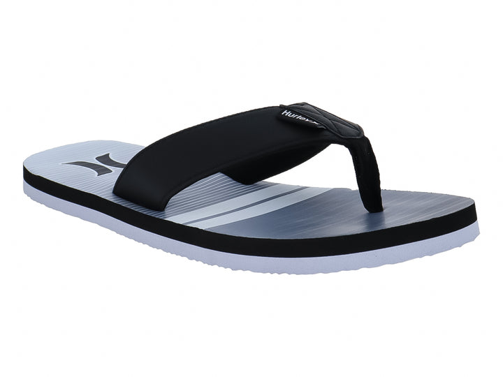 Sandalias Hurley modelo Freestone en colores blanco y negro con diseño plano y correa negra.