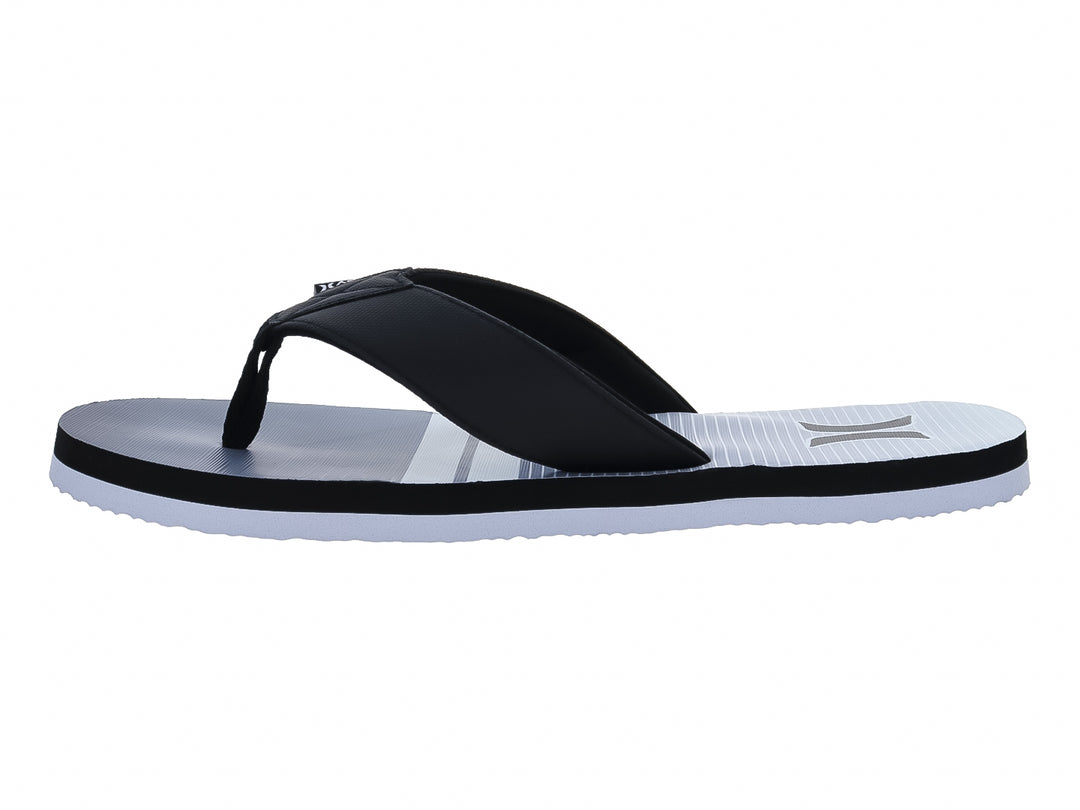 Sandalias Hurley modelo Freestone en colores blanco y negro con diseño plano y correa negra.