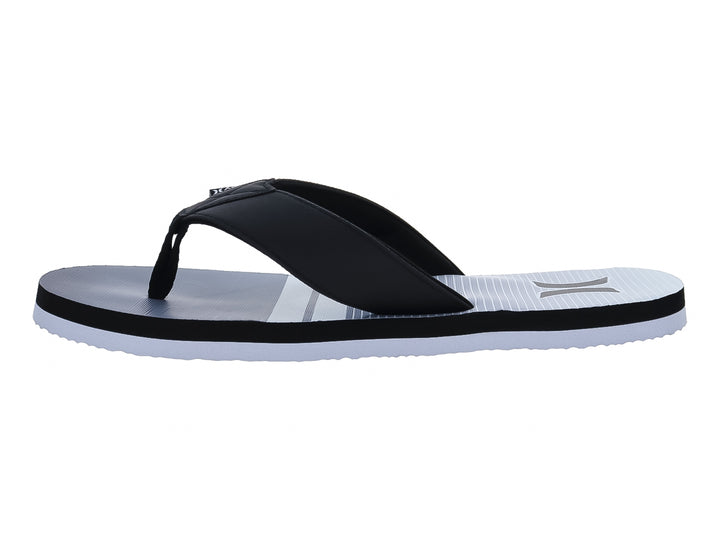 Sandalias Hurley modelo Freestone en colores blanco y negro con diseño plano y correa negra.