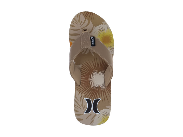 Sandalias Hurley color tan con suela blanca y diseño gráfico en la plantilla.