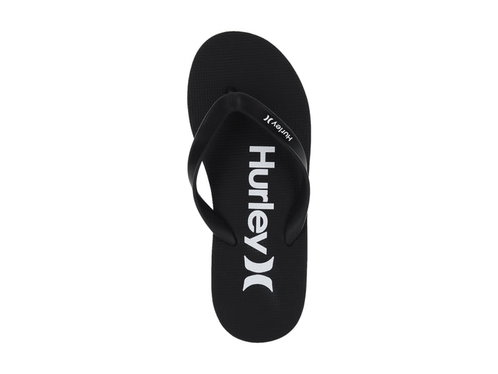 Sandalias de dedo color negro marca Hurley con suela plana y correa sencilla.