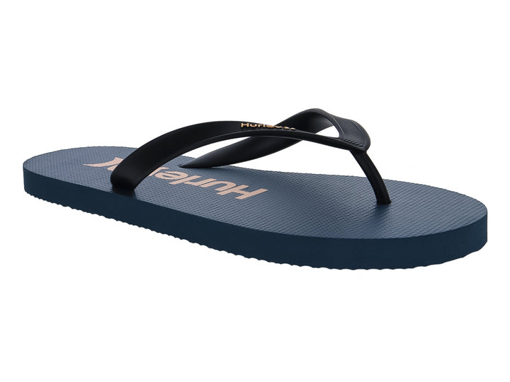 Sandalias Hurley color azul con correas negras, diseño plano y casual para uso diario.