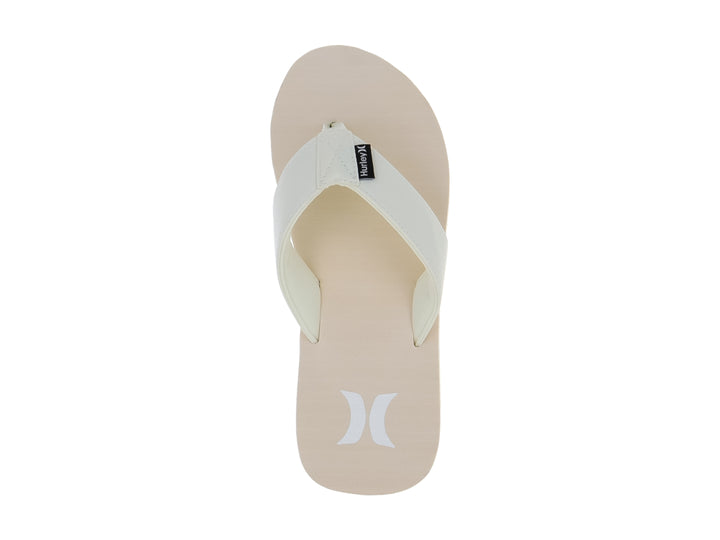 Sandalias Hurley en colores beige y marfil con suela blanca y diseño casual.