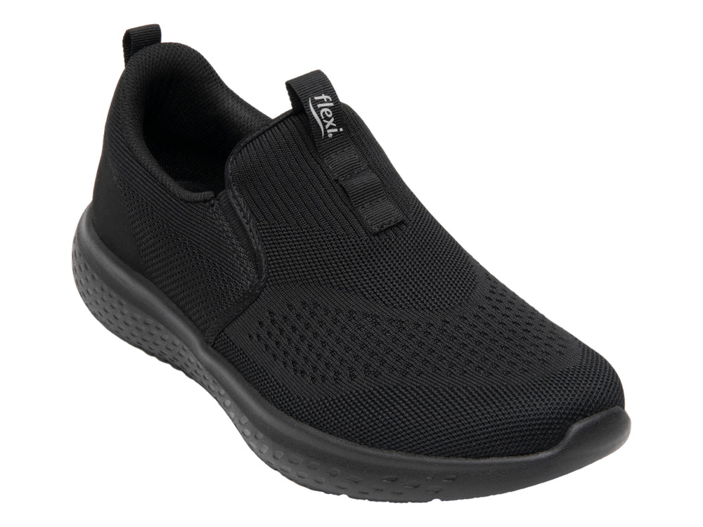 Zapato deportivo Flexi color negro, estilo slip-on con tejido transpirable y suela robusta.