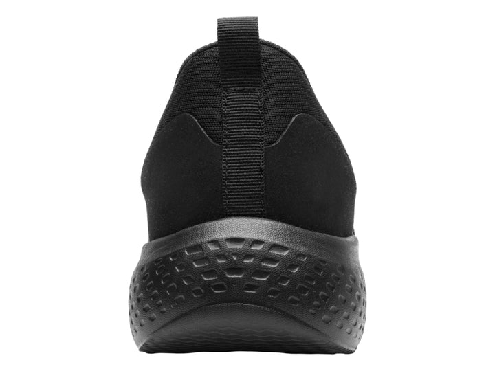 Zapato deportivo Flexi color negro, estilo slip-on con tejido transpirable y suela robusta.
