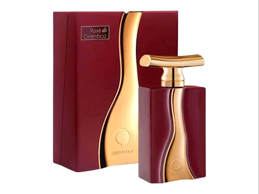 Perfume Orientica Rosé de Orientica en frasco y caja color guinda con detalles dorados brillantes.