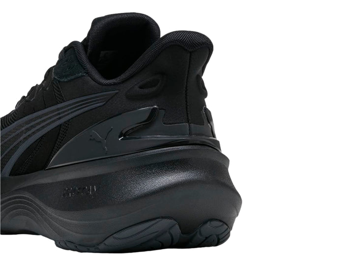 Tenis deportivos PUMA Pulse Pro en color negro con tejido de malla y suela robusta.