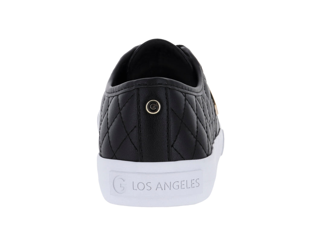 Tenis casuales GBG color negro con textura acolchada, detalles dorados y suela blanca.