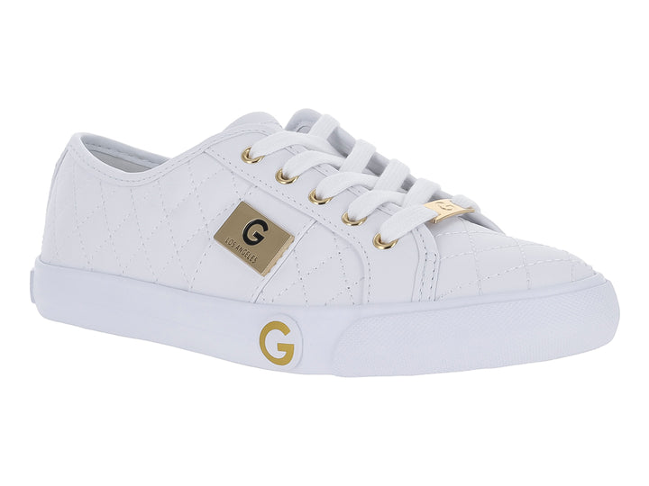 Tenis casuales color blanco para mujer con textura acolchada en rombos y detalles decorativos en dorado.