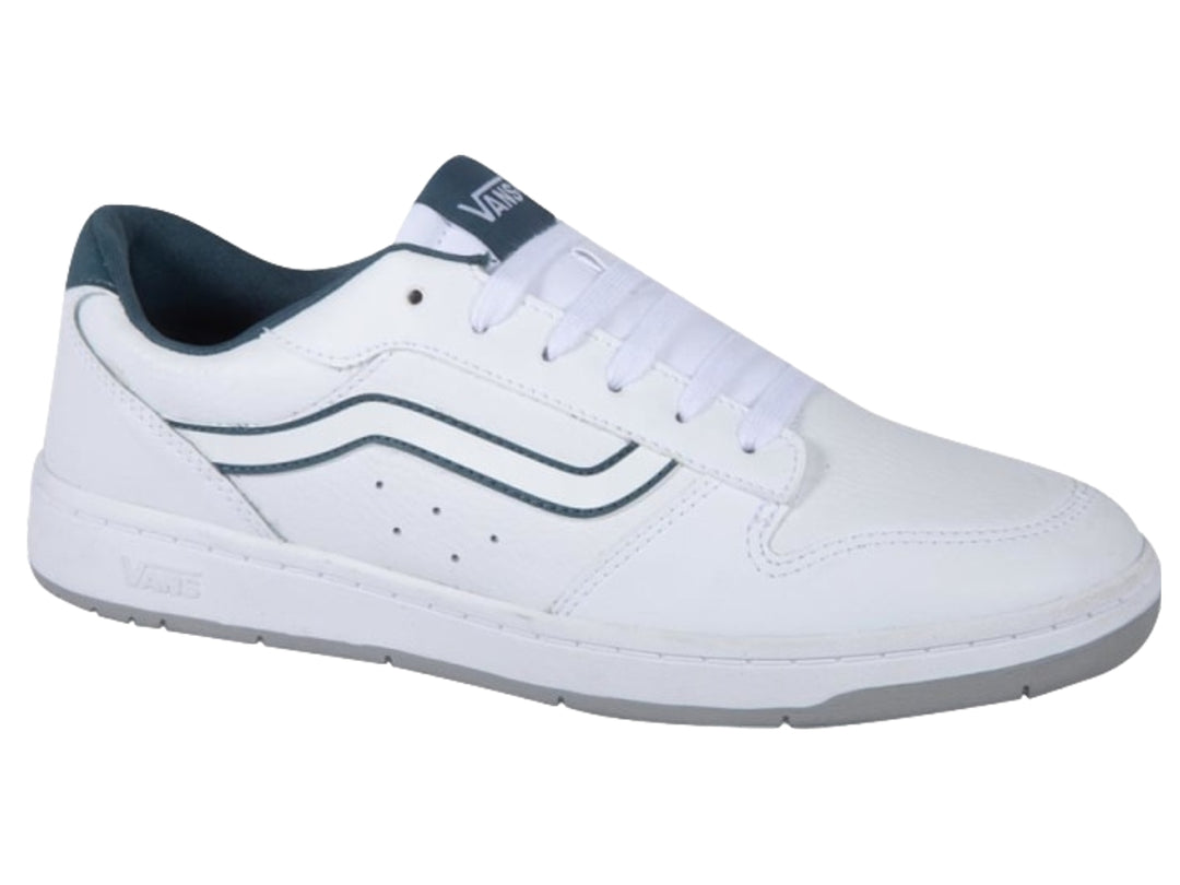 Tenis VANS blancos con detalles en verde oscuro y suela gris, diseño deportivo casual.