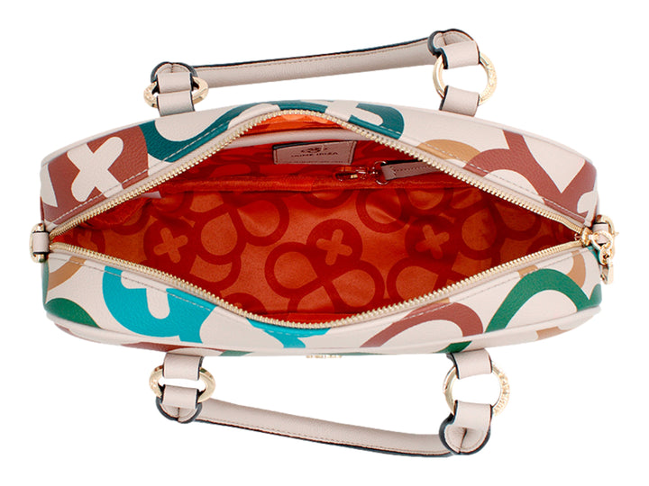 Bolsa Jaime Ibiza multicolor con estampado de figuras geométricas en tonos crema, verde, café y azul.