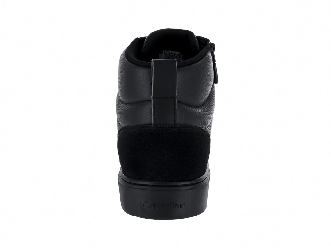 Tenis botín Calvin Klein de cuero negro con cordones y cierre lateral.