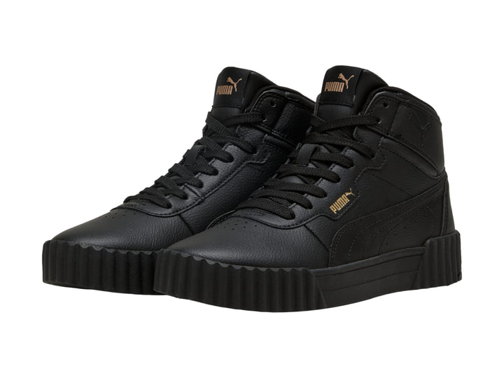 Tenis PUMA Carina 3.0 Mid en color negro con suela de plataforma y diseño de bota.