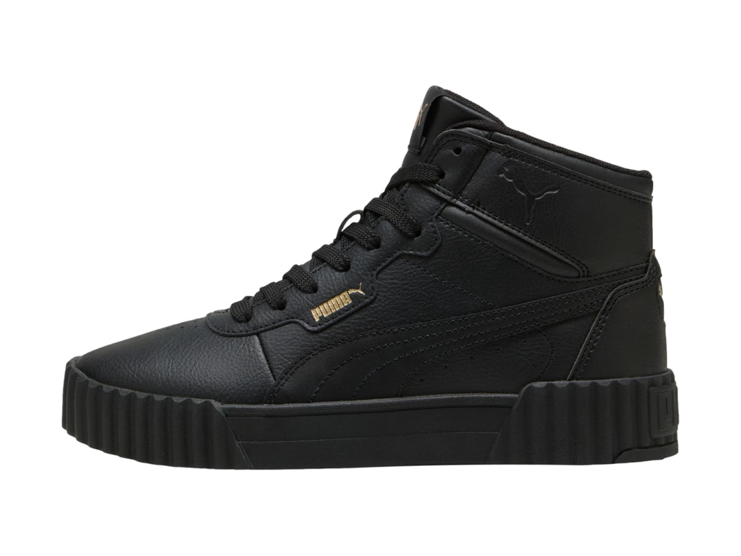Tenis PUMA Carina 3.0 Mid en color negro con suela de plataforma y diseño de bota.
