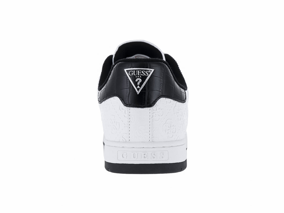 Tenis blancos de la marca GUESS con una franja roja lateral y suela negra.