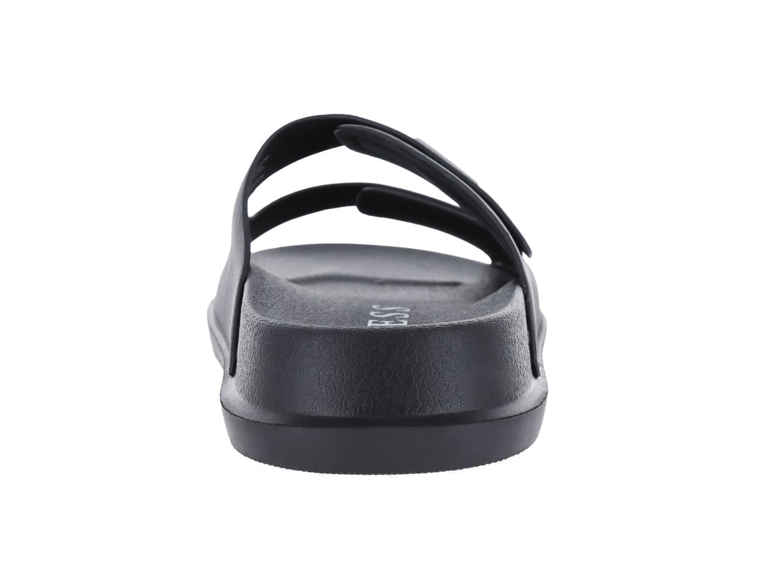 Sandalia deslizable color negro de la marca GUESS con dos correas superiores y suela plana.