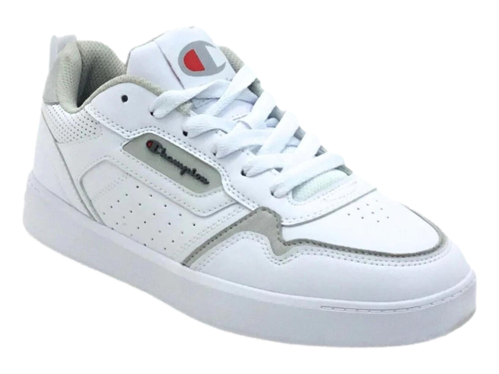 Tenis Champion color blanco con detalles en gris y perforaciones laterales, vista lateral.