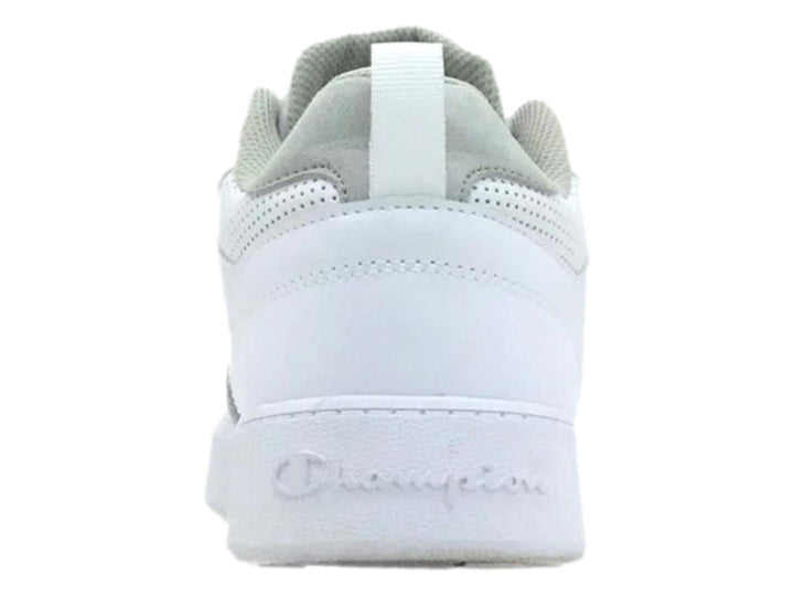 Tenis Champion color blanco con detalles en gris y perforaciones laterales, vista lateral.