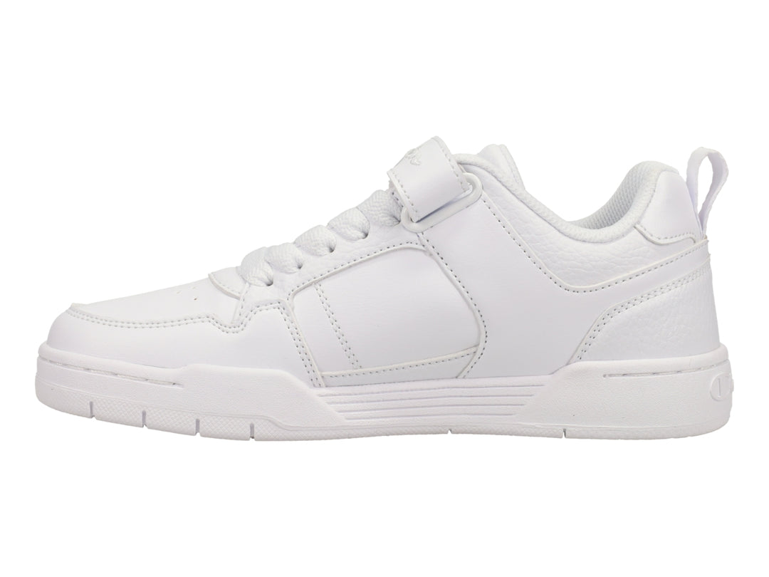 Tenis deportivos Champion color blanco para niños con cierre de velcro y cordones.