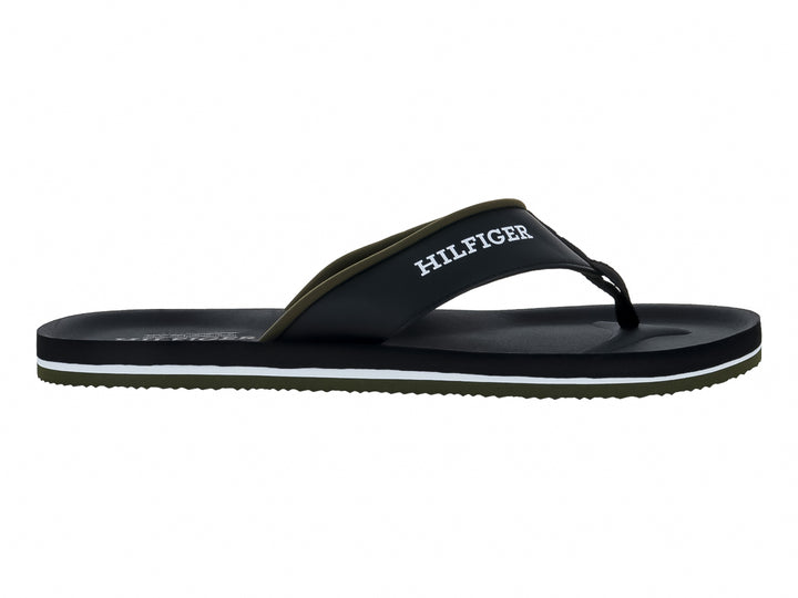 Sandalias de dedo negras Tommy Hilfiger con detalle blanco y verde en la suela.